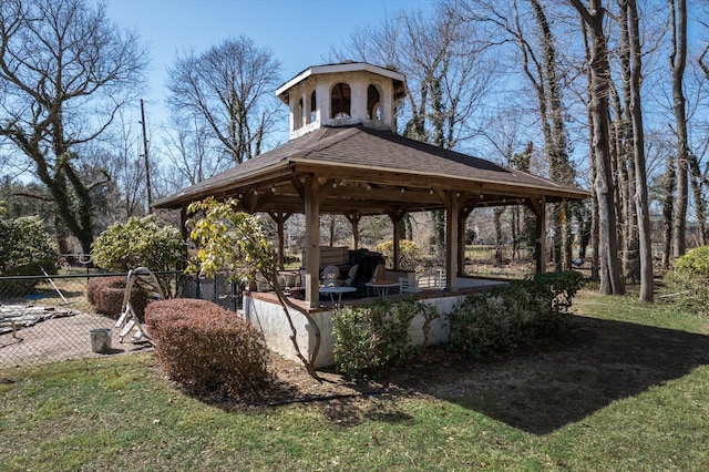 view of yard with a gazebo and fence