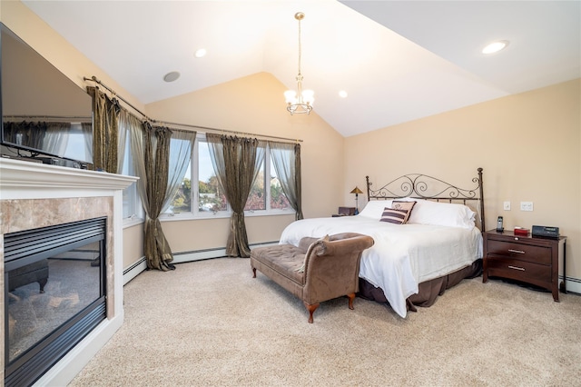 bedroom featuring a baseboard heating unit, lofted ceiling, a tile fireplace, and light carpet