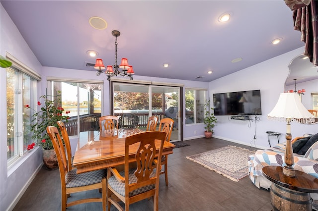 dining room with lofted ceiling, recessed lighting, visible vents, and baseboards