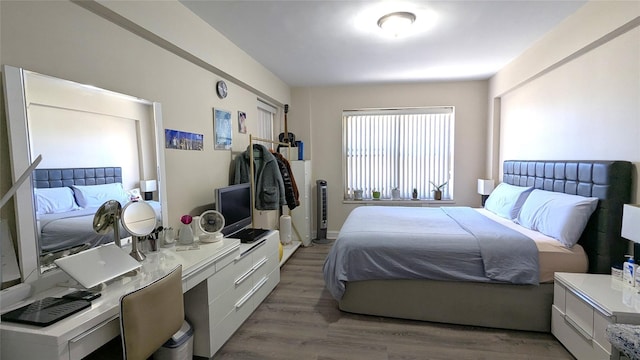 bedroom featuring light wood finished floors