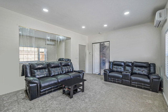 carpeted living area featuring recessed lighting, baseboards, and a wall mounted air conditioner