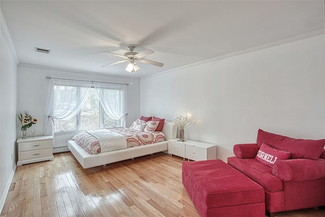 bedroom featuring visible vents, crown molding, light wood-type flooring, a ceiling fan, and a baseboard radiator