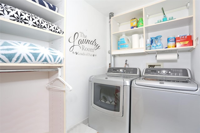 clothes washing area featuring laundry area and independent washer and dryer