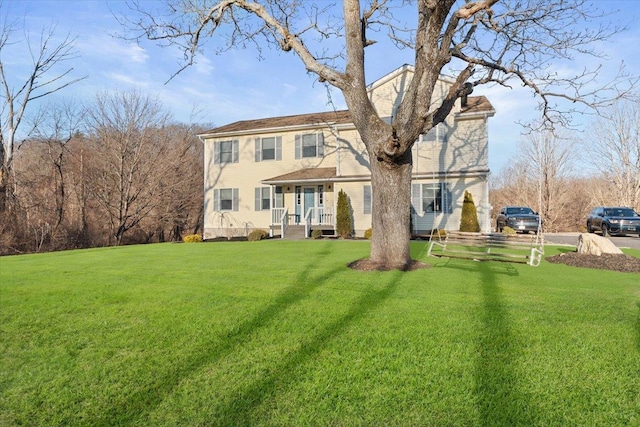 view of front of home with a front yard