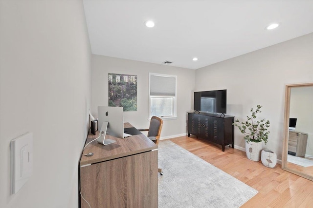 home office featuring visible vents, recessed lighting, light wood-type flooring, and baseboards