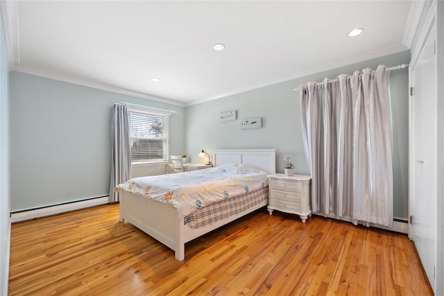 bedroom featuring recessed lighting, baseboard heating, light wood-style flooring, and crown molding