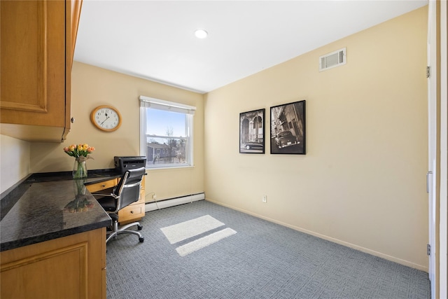 office with visible vents, baseboards, carpet, and a baseboard radiator