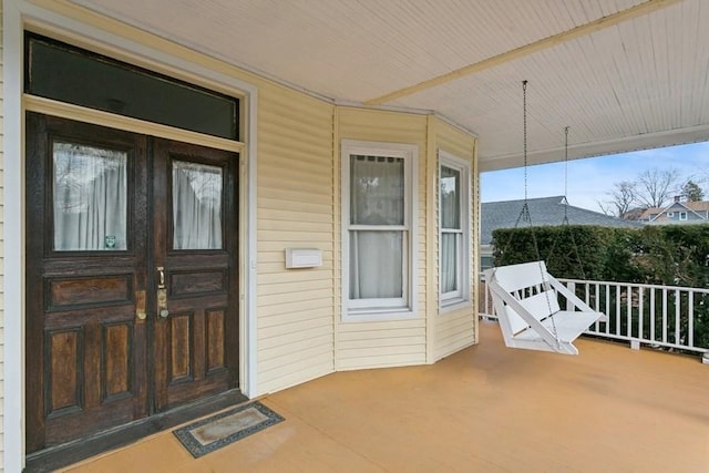 entrance to property with a porch