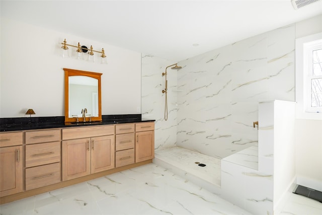 full bath featuring vanity, visible vents, marble finish floor, and a marble finish shower