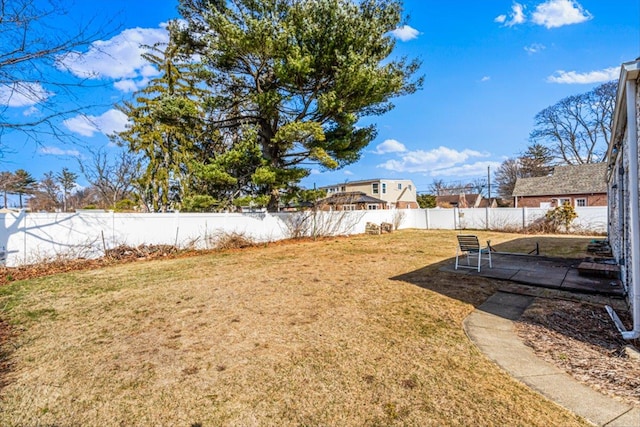 view of yard featuring a fenced backyard