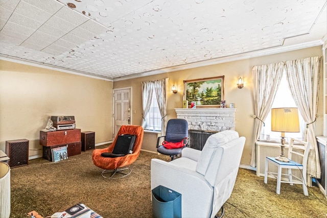 carpeted living area featuring a brick fireplace and crown molding