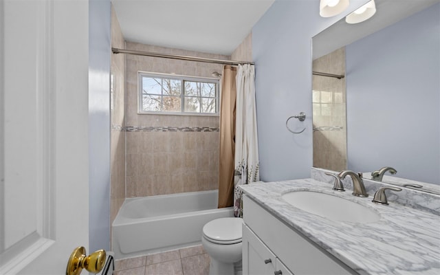 full bathroom with vanity, tile patterned floors, shower / tub combo, and toilet