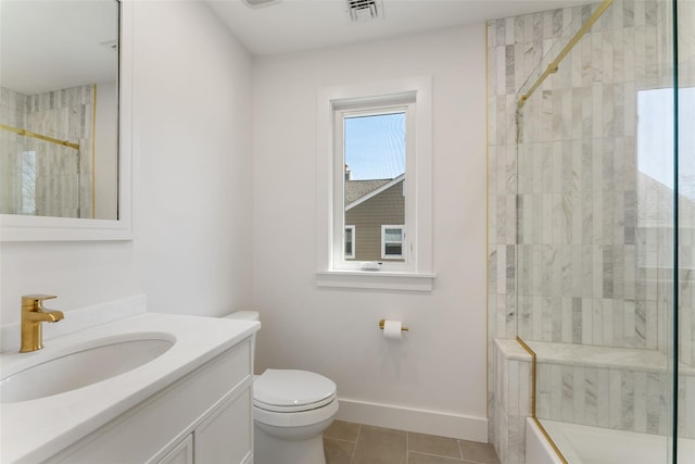 bathroom featuring baseboards, visible vents, tiled shower, tile patterned floors, and toilet