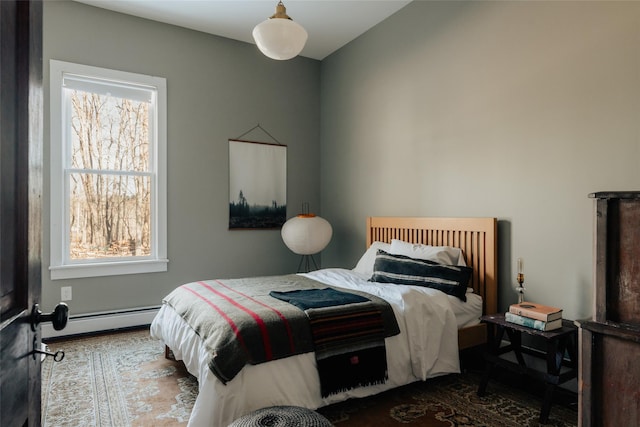 bedroom with a baseboard radiator