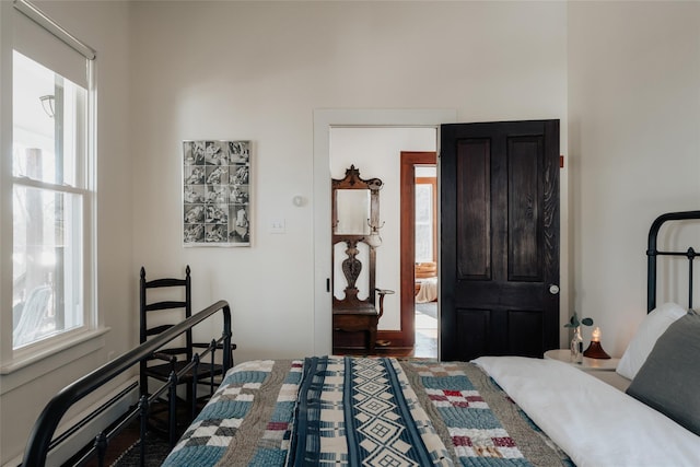 bedroom featuring multiple windows