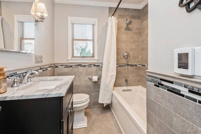 bathroom featuring vanity, toilet, shower / bath combo, and crown molding