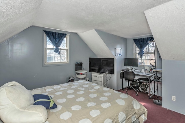 carpeted bedroom featuring multiple windows, a textured ceiling, and vaulted ceiling