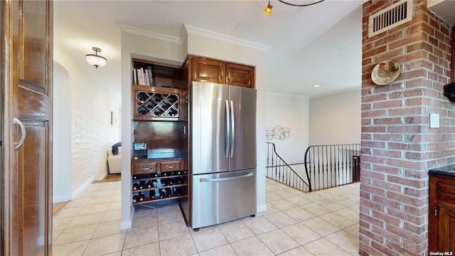 kitchen with visible vents, crown molding, light tile patterned floors, freestanding refrigerator, and open shelves