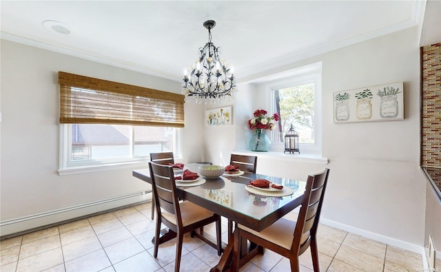 dining room with a baseboard radiator, plenty of natural light, baseboards, and ornamental molding