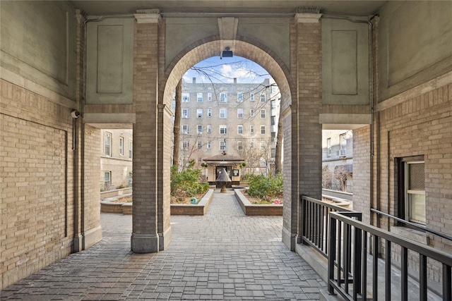 view of patio with a balcony