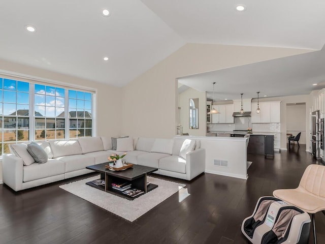 living room featuring recessed lighting, visible vents, lofted ceiling, and dark wood-style flooring