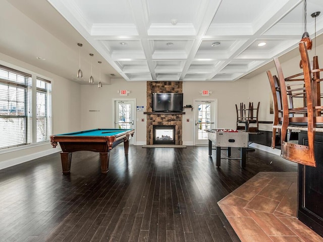 rec room with baseboards, beamed ceiling, a fireplace, wood finished floors, and coffered ceiling