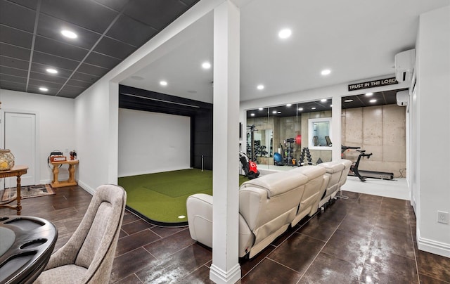 interior space featuring recessed lighting, a wall mounted AC, and golf simulator