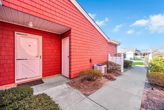 entrance to property with central AC unit