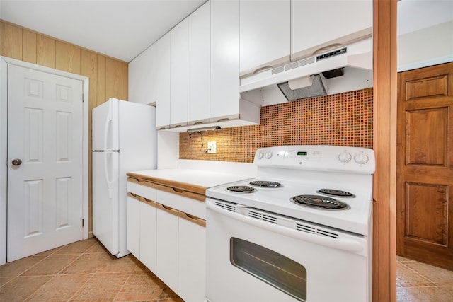 kitchen with under cabinet range hood, white appliances, tasteful backsplash, and white cabinets