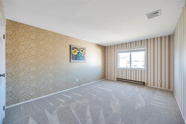 carpeted empty room with a baseboard radiator, baseboards, visible vents, and wallpapered walls