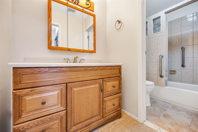 full bath with visible vents, tub / shower combination, baseboards, toilet, and vanity