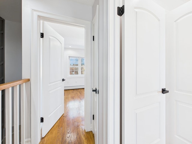 hallway featuring light wood-type flooring