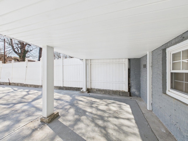 view of patio / terrace featuring fence