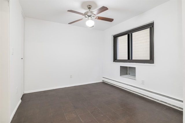 unfurnished room with a ceiling fan, baseboards, and a baseboard radiator