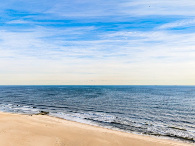 view of water feature with a beach view