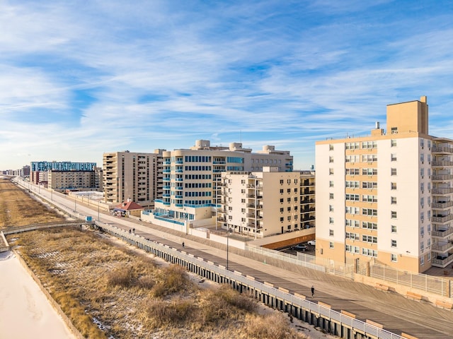 birds eye view of property featuring a city view