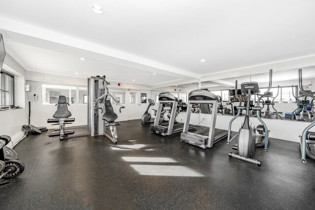 gym with recessed lighting and baseboards