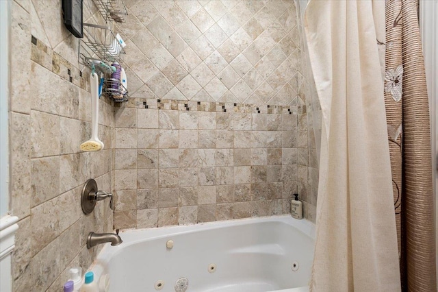 bathroom featuring a combined bath / shower with jetted tub