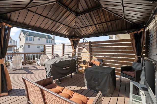 deck with a gazebo and grilling area