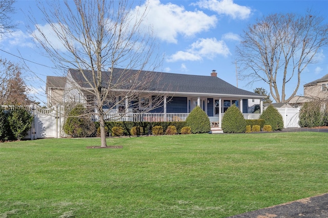 ranch-style house featuring a front yard, a gate, fence, a porch, and a chimney