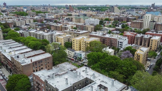 drone / aerial view with a view of city