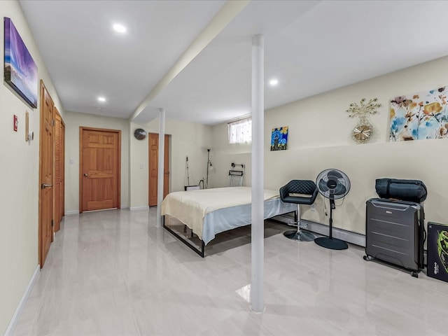 bedroom with recessed lighting and baseboards