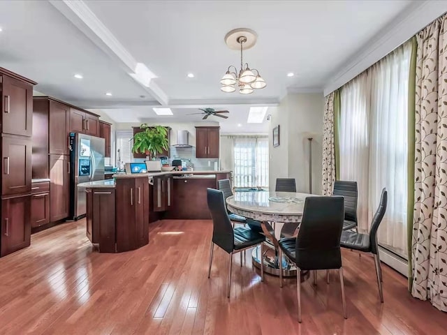 dining area featuring a baseboard radiator, beam ceiling, recessed lighting, light wood-style floors, and crown molding