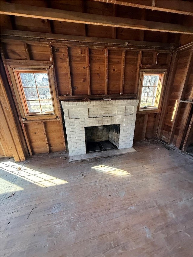 unfurnished living room featuring a fireplace