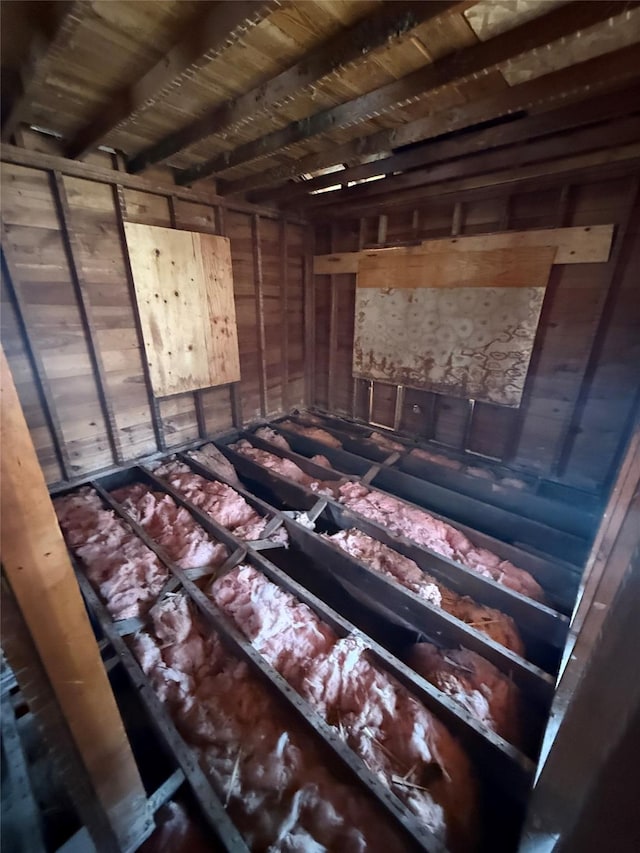 miscellaneous room with beam ceiling and wood ceiling