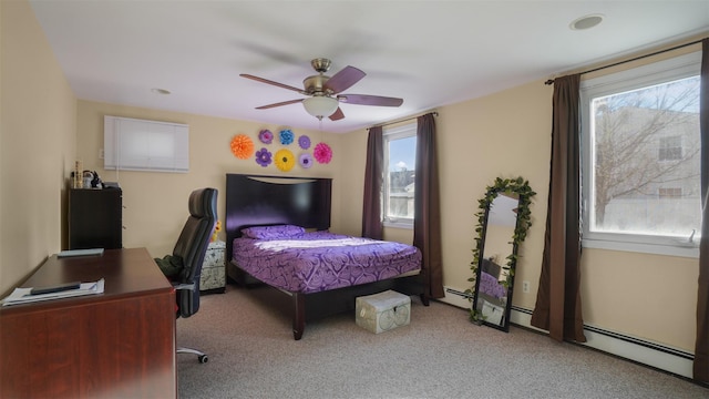 carpeted bedroom featuring a ceiling fan