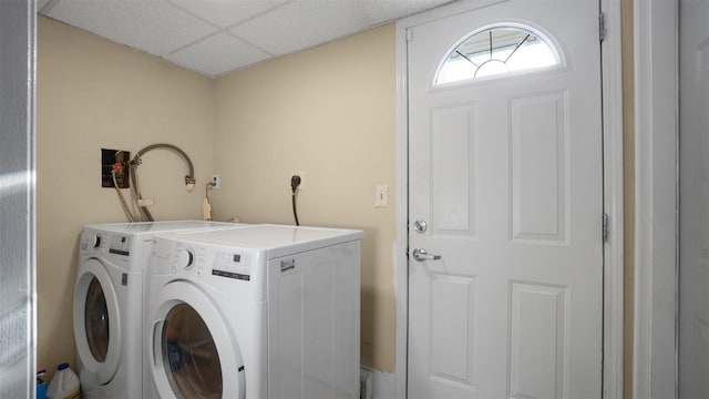 laundry room with laundry area and washing machine and clothes dryer