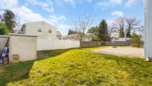 view of yard with a patio area and a fenced backyard