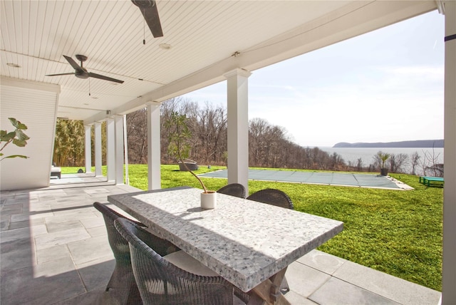 view of patio featuring ceiling fan