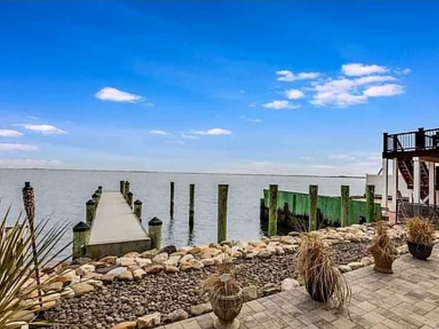 dock area featuring a water view